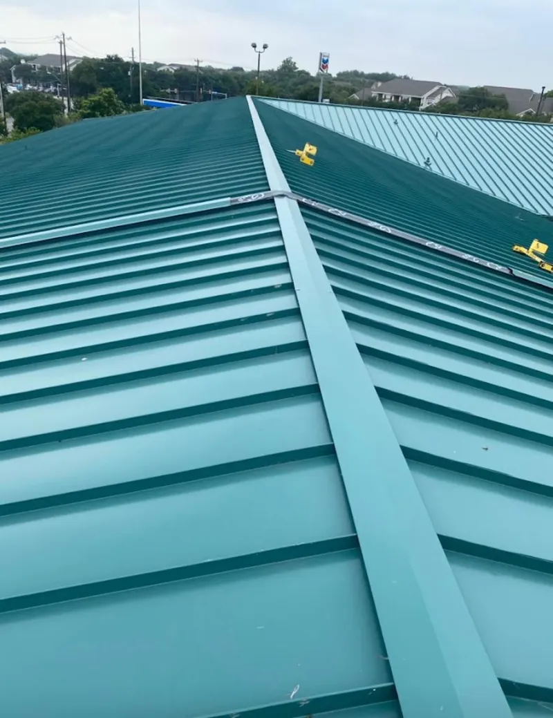 Green commercial metal roof ridge and valley for Metal Roof Repair in North Druid Hills